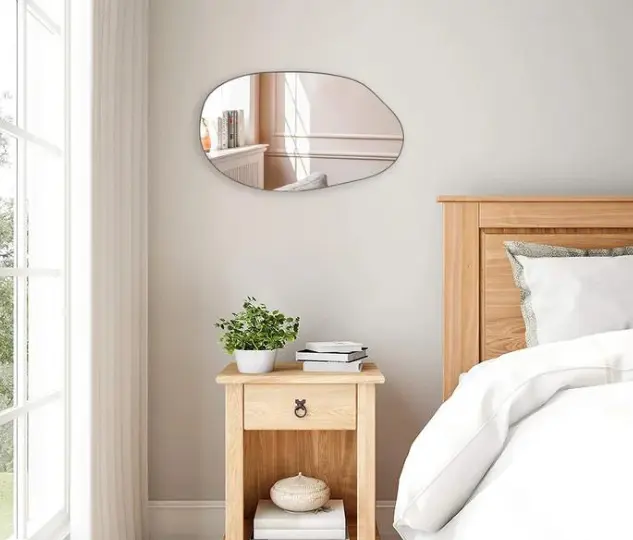 Reflections Unleashed: Asymmetrical Wall Mirror for Unique Décor!